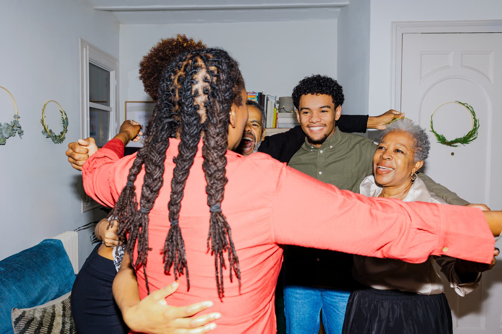 Family embracing in a joyful group hug